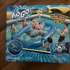 Brand New Unopened shark ride on pool float